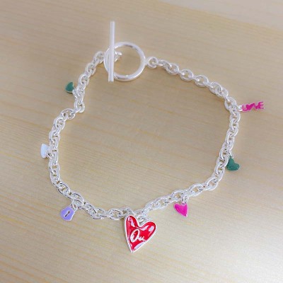 Ciondolo mini "love'' con smalto fucsia 9.4 x 2.6mm Argento 925